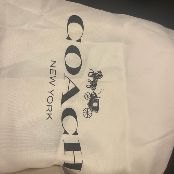 Coach backpack, cream with black back, excellent condition. Used only once. - Picture 9 of 11